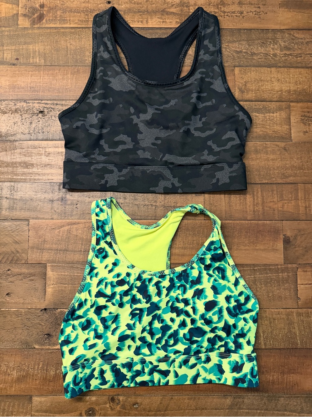 Set of Two Fabletics Sports Bras - Black Camo & Neon Green Leopard Print- medium